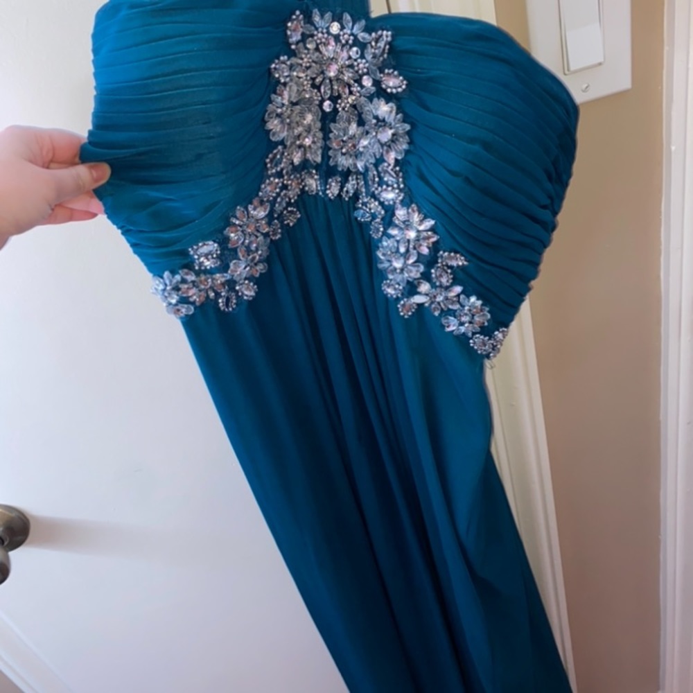 Blue single strapped long prom dress.